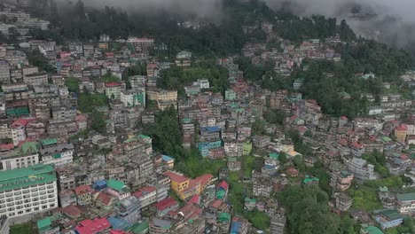 aerial view of the city of the morning foggy weather and many trees ,west bengal , darjeeling