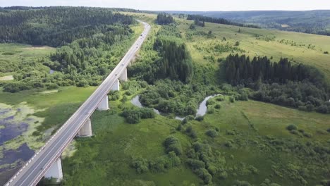 aerial view of a bridge over a river and countryside