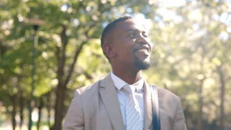 happy, walking and businessman in a park