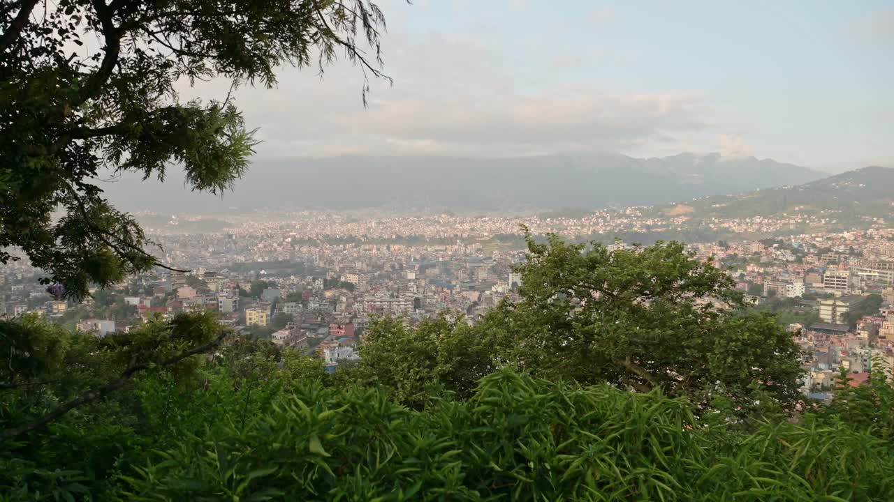 Kathmandu City Cityscape in Nepal, Elevated View from Above at Monkey Temple of Beautiful Mountains Landscape Scenery Showing Urbanisation and Urban Sprawl