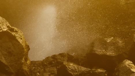 waterfall splashing on rocks