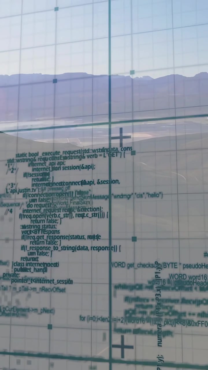 Vertical video: Handheld cam starting pan, moving grid and code across valley, showing UI shift
