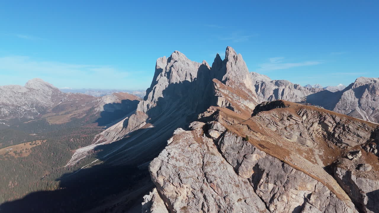 Aerial along Seceda ridgeline reveals Seggiovia fermeda chairlift, Dolomites