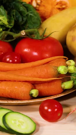 assorted vegetables displayed on a black background