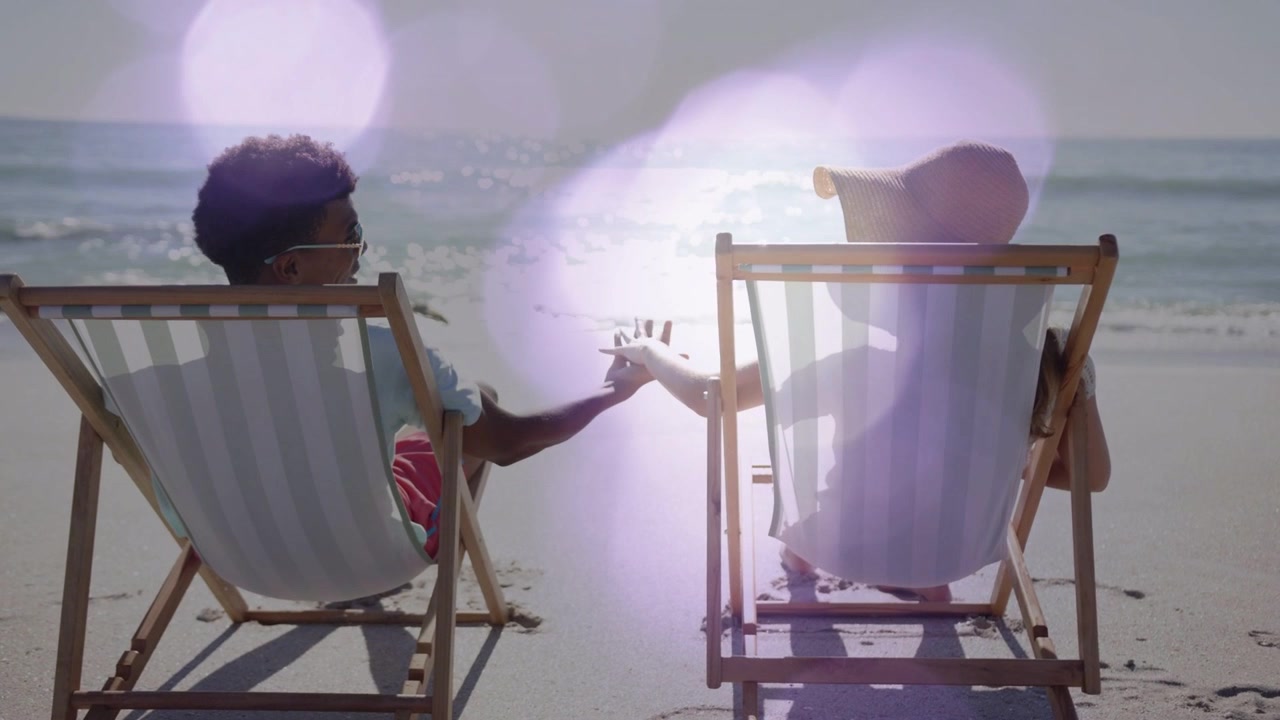Man raising hand reaching woman on decks holding hands for bond while travel purple bokeh drifting