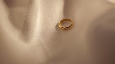 gold rings on velvet fabric background. jewelry for wedding or engagement.