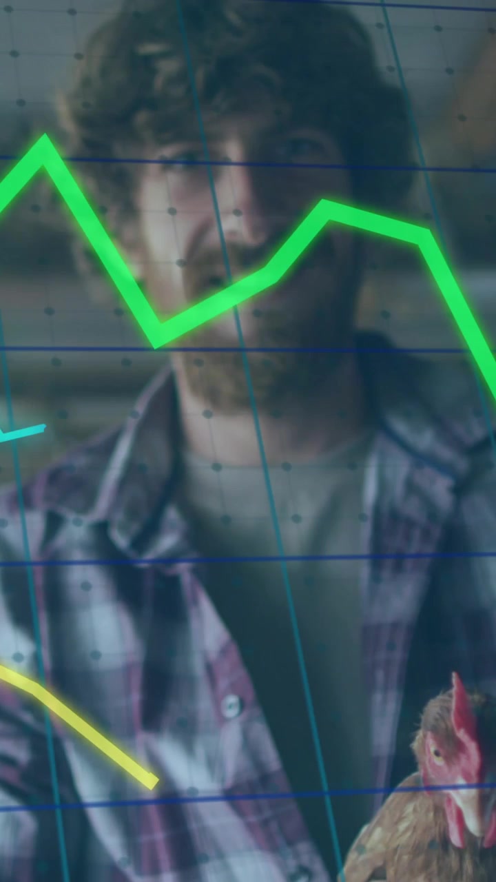 Animation of financial data processing over caucasian man holding chicken
