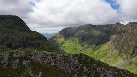 Flight-Over-The-Rugged-Scottish-Landscape-of-Glencoe-In-The-Highlands-of-Scotland,-United-Kingdom