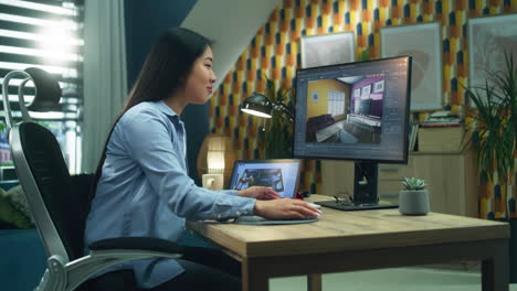 woman interior designer working on computer