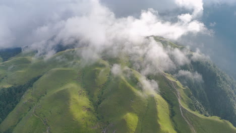aerial view of misty green mountains