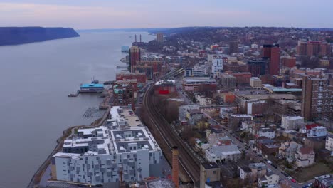 aerial forward over yonkers city near hudson river, new york