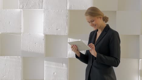 businesswoman with tablet computer indoor