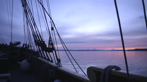 1700s sailing ship underway at sunrise