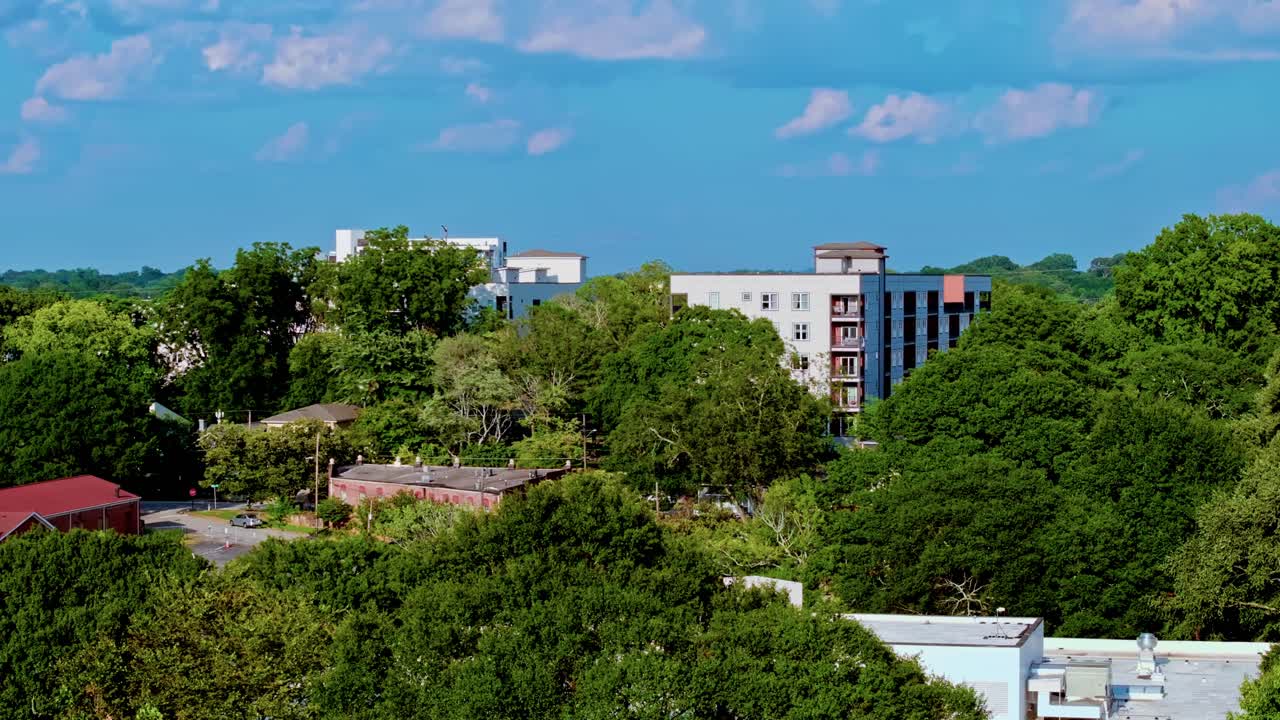 Atlanta city residential neighbourhood surrounded by green trees under blue sky, Urban garden, Georgia, Aerial