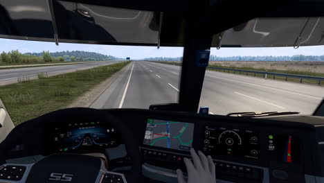 first-person view of a truck driving on a highway with in-cab navigation