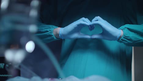 Heart-surgery-concept.-Medical-treatment.-Medical-hands-show-heart