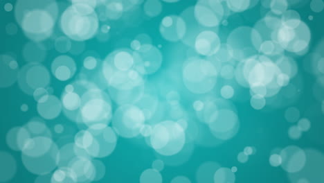 blue abstract background with fast chaotically moving blurred circular bokeh. looped animation.