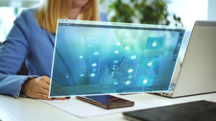 Business woman in blue blouse sitting in front of digital screen opens secure file in cloud and opens the database, home office