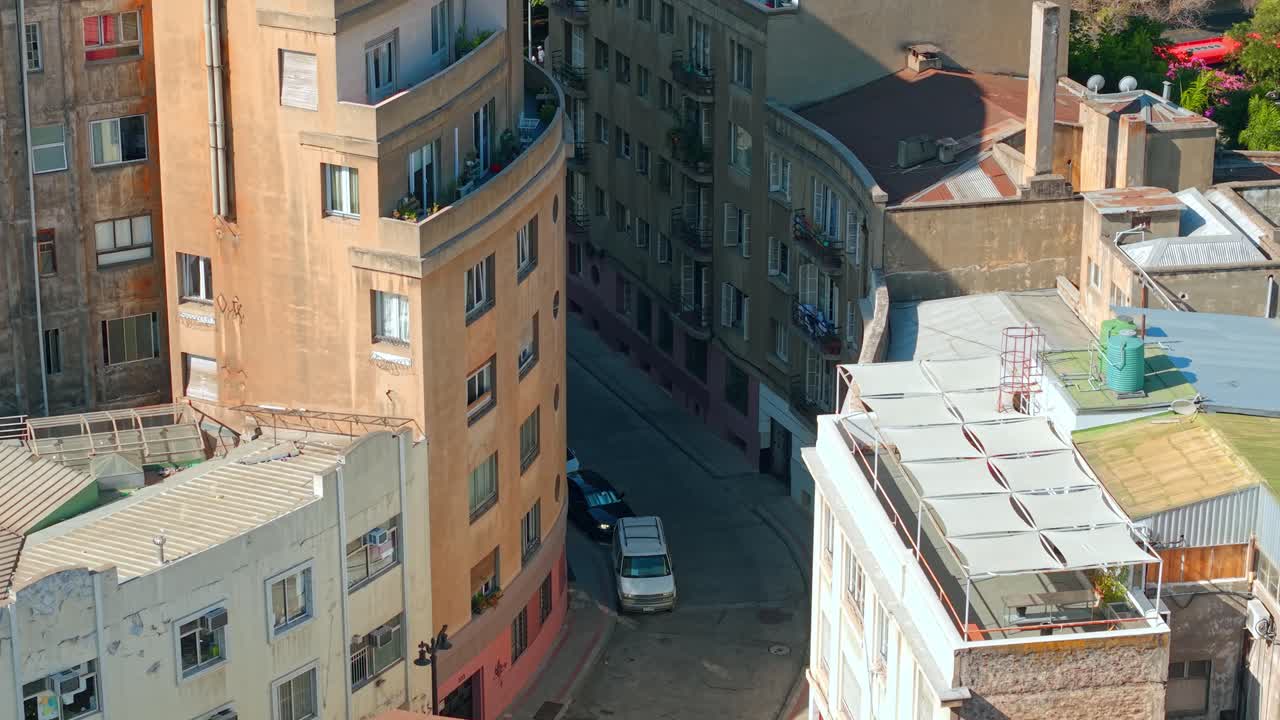 Aerial fly narrow street Historic colorful Neighborhood in Santiago, Chile Downtown