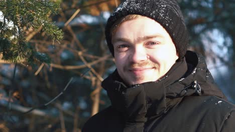 man in a snowy forest