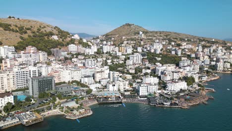 Cinematic-Orbiting-Drone-Shot-Above-Saranda,-Albania-in-Summer