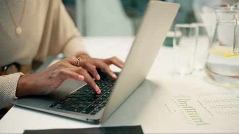 woman working on laptop at desk