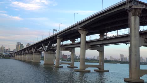 cheongdamdaegyo double-layered bridge in seoul korea han river under the bright cloudy sky - close up shot