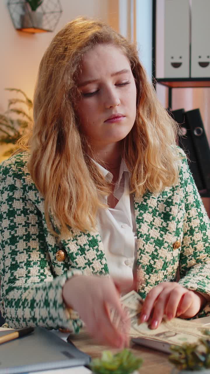 Business woman freelancer counting cash insufficient amount of money financial crisis bankruptcy