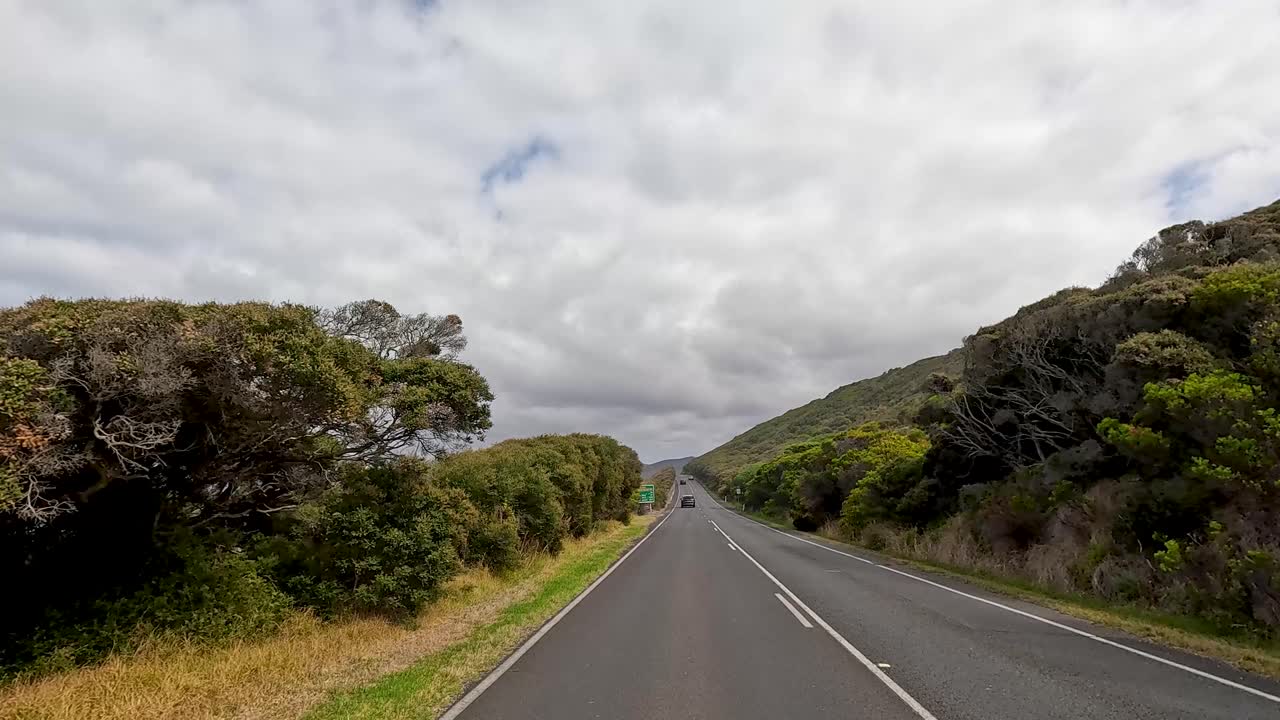 A 45-second video capturing a drive through lush landscapes and winding roads along the Great Ocean Road in Australia