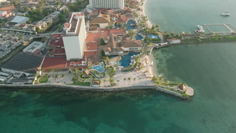 Aerial-push-in-on-luxury-resort-nestled-in-Ocho-Rios,-Jamaica