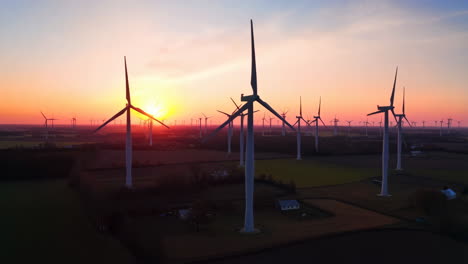 wind turbines at sunset