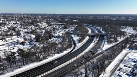 a high angle view of a highway after a heavy snowfall