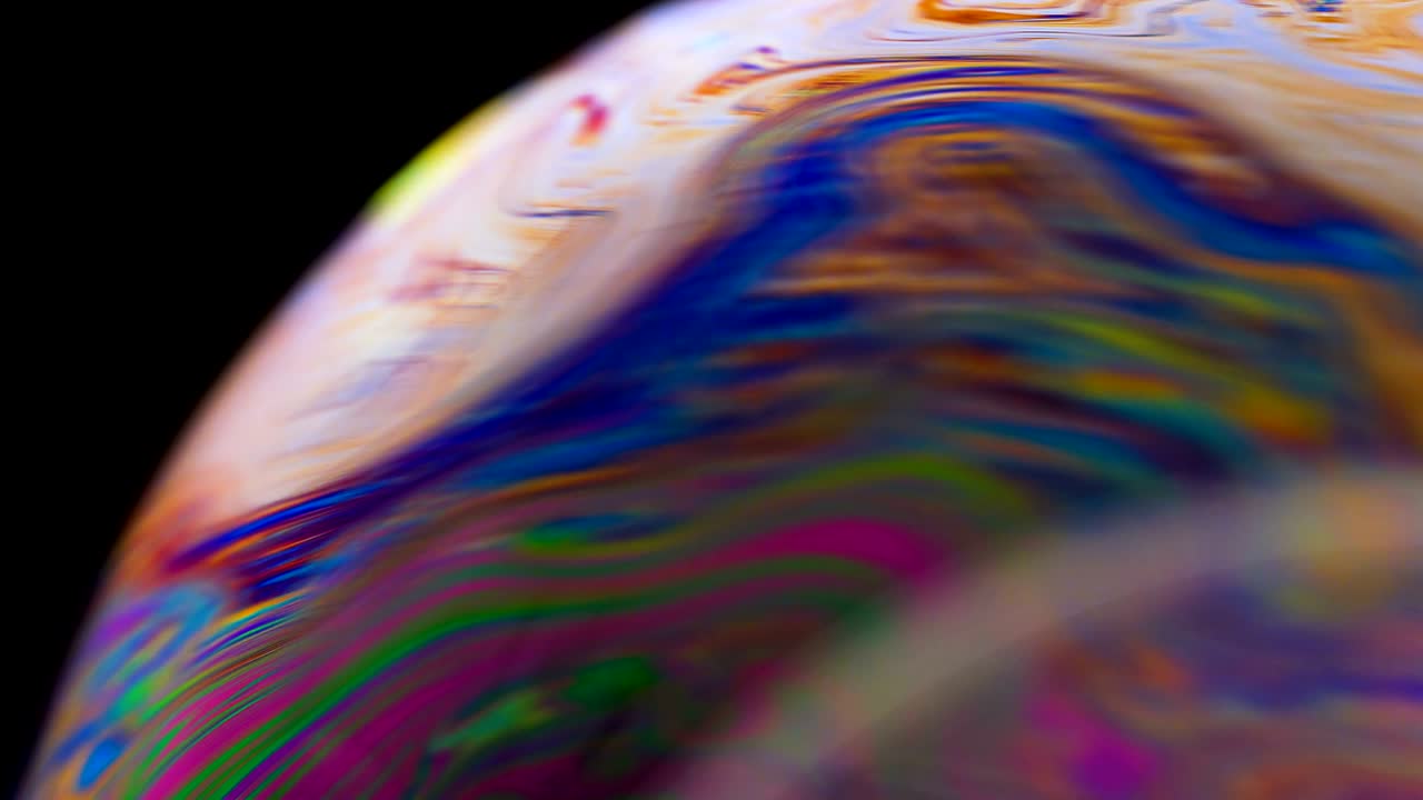 las colores del arco iris de las burbujas de jabón