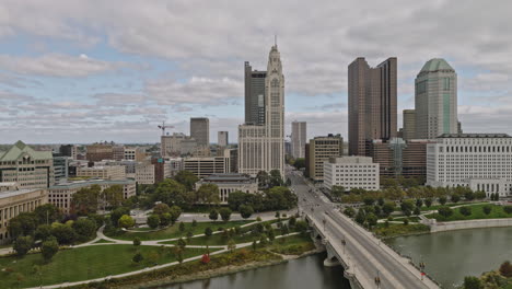 columbus ohio aerial v48 low drone flyover scioto river along discovery bridge capturing battelle riverfront park, city council building, downtown cityscape - shot with inspire 3 8k - sept 22nd 2023