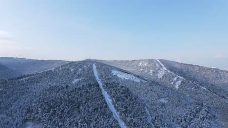 frozen hills winter road aerial view