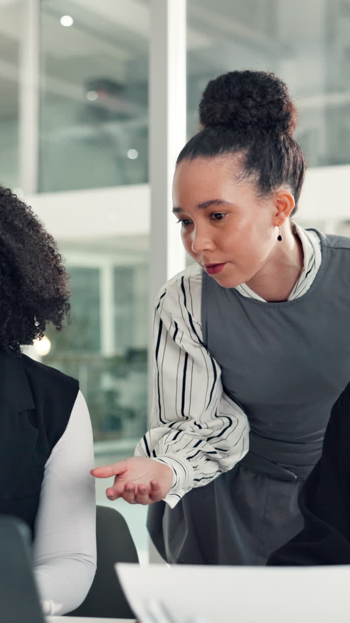 Professional Woman Explaining Project Details to Colleagues in Office Meeting