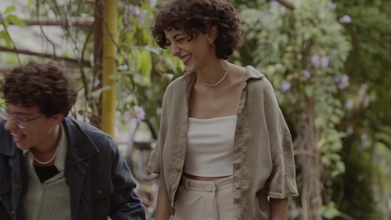 Friends Laughing and Talking in a Garden