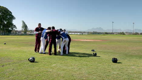 Baseball team huddling on field, preparing for game strategy discussion