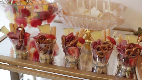 small glasses of food for events, cookies with fine ham, take detail, concept events and celebrations