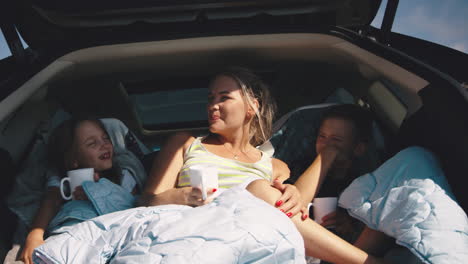 family road trip in the car trunk