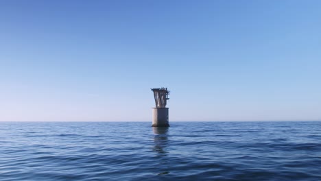 Drone-Volando-Cerca-Del-Agua-Y-Acercándose-A-Una-Estructura-Abandonada-En-Medio-Del-Mar