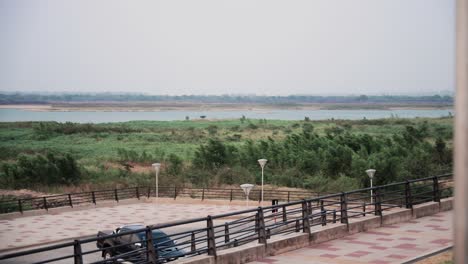 pan around the lookout at asuncion´s costanera, lots of nature, river, and blue skies
