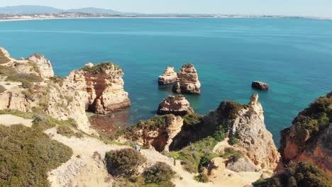 panoramic view of emerald atlantic ocean coast of lagos, algarve, portugal