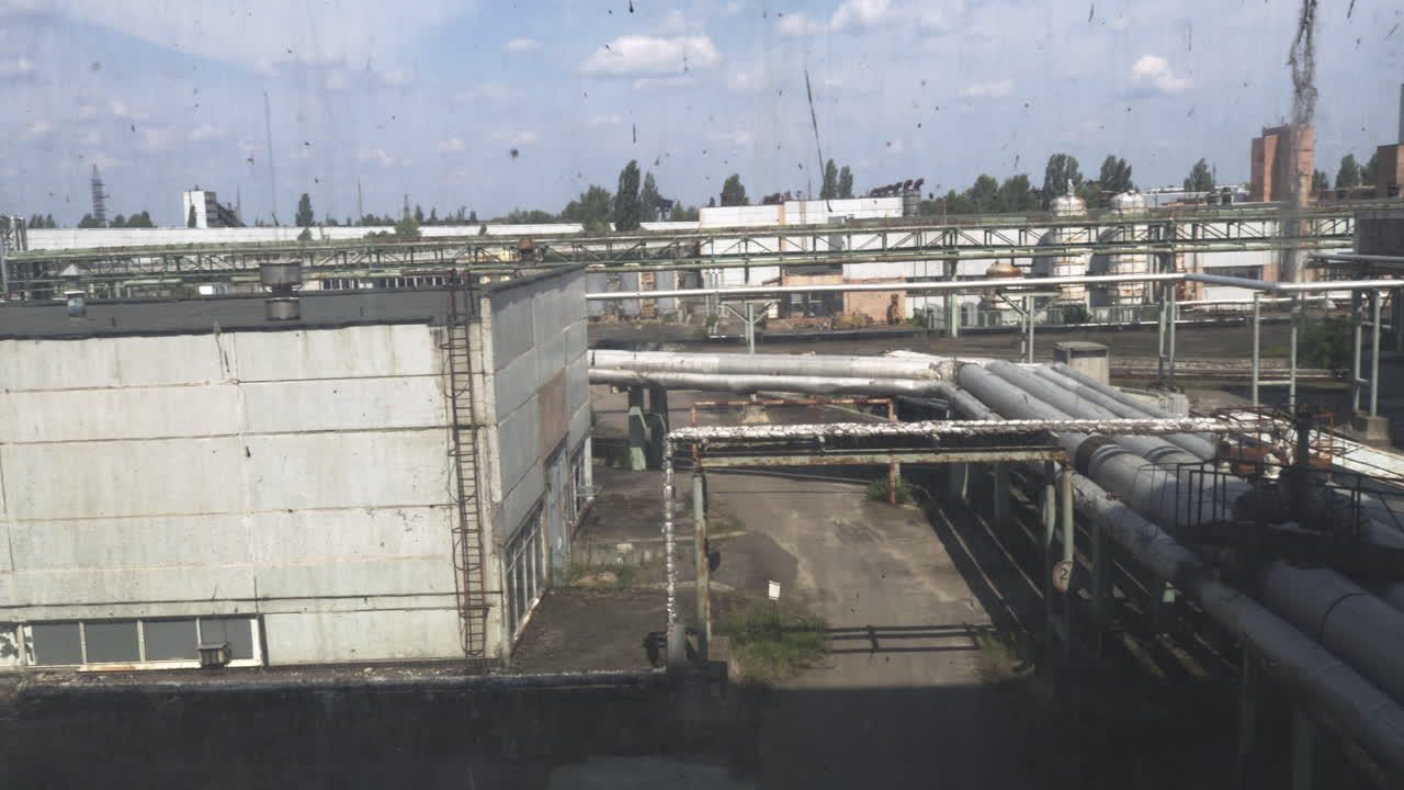 A View Of Deserted Facility Buildings At Chernobyl Nuclear Power Plant In Ukraine. Wide Shot