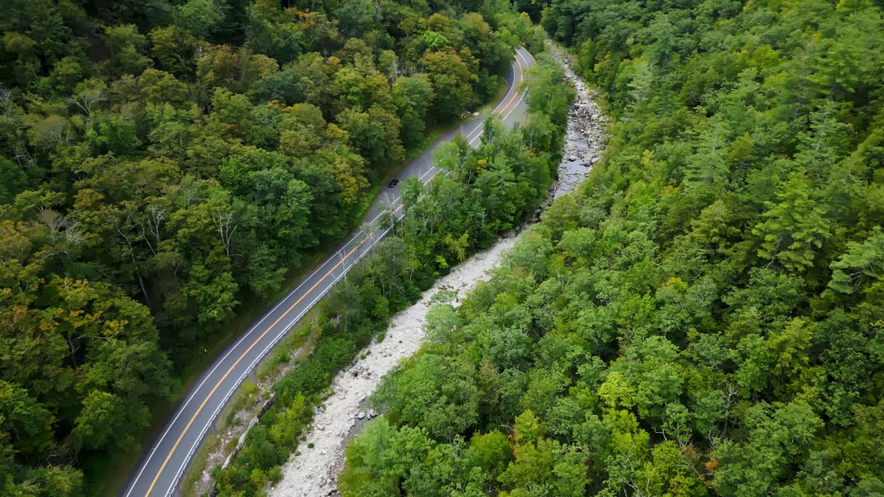 Scenic aerial view of Mohawk Trail road in lush Massachusetts forest