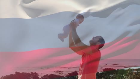 Animation-of-flag-of-russia-over-caucasian-man-with-baby-at-beach