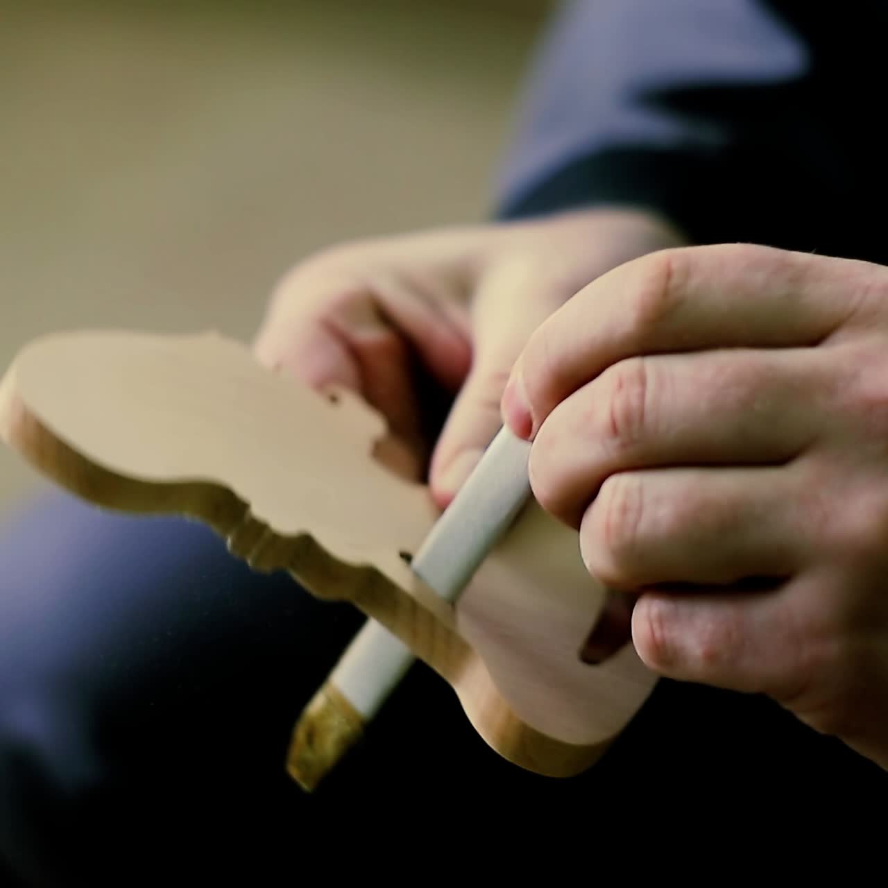 Carpenter Sending Piece Of Timber In His Workshop