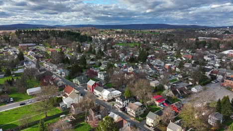 American-town-on-bright-sunny-day-under-dramatic-clouds