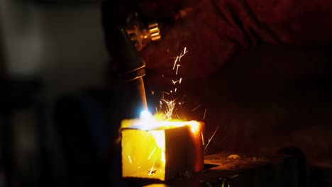 Welder-welding-a-metal