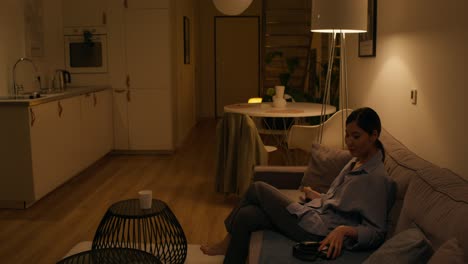 woman relaxing at home in the evening